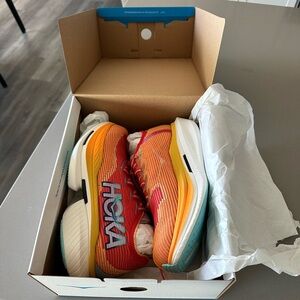 BRAND NEW Hoka Cielo x1 Vibrant Orange and Teal Sneakers